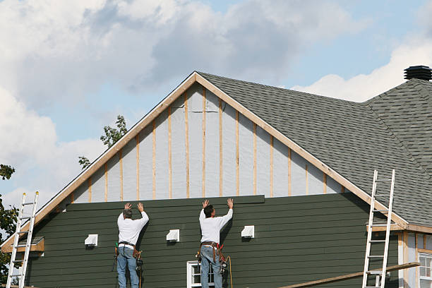 Professional Siding Installation technician working in Bunola, PA